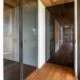 AXON pivot door and DIGERO sliding all-glass wall